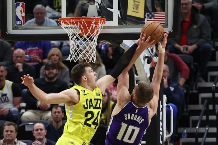 Utah Jazz center Walker Kessler (24) blocks the shot of Sacramento Kings forward Domantas Sabonis (10) in the fourth quarter at Vivint Arena.
